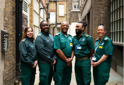 A picture of the patient transport team smiling