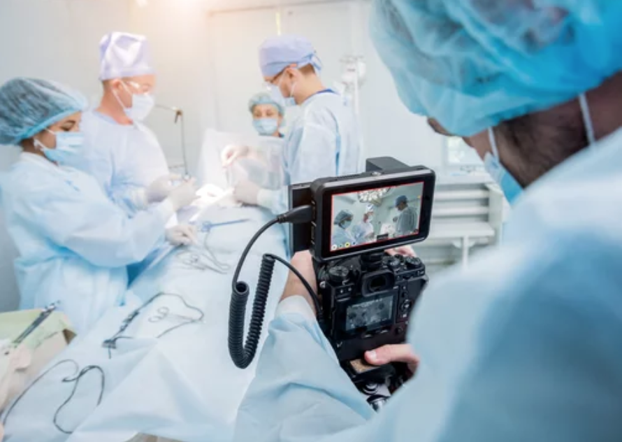 camera filming doctors in surgery setting