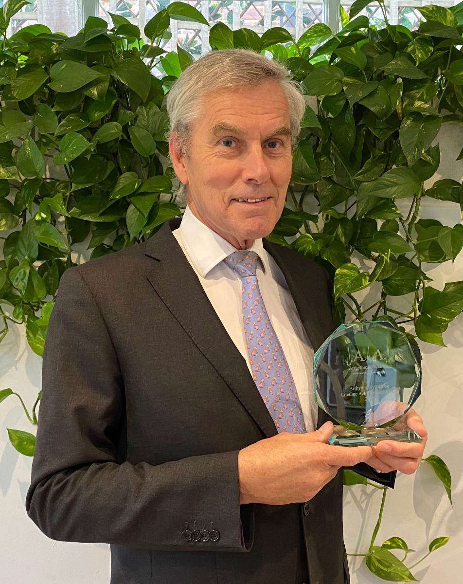 Edward Rowland with lifetime achievement award from heart rhythm association