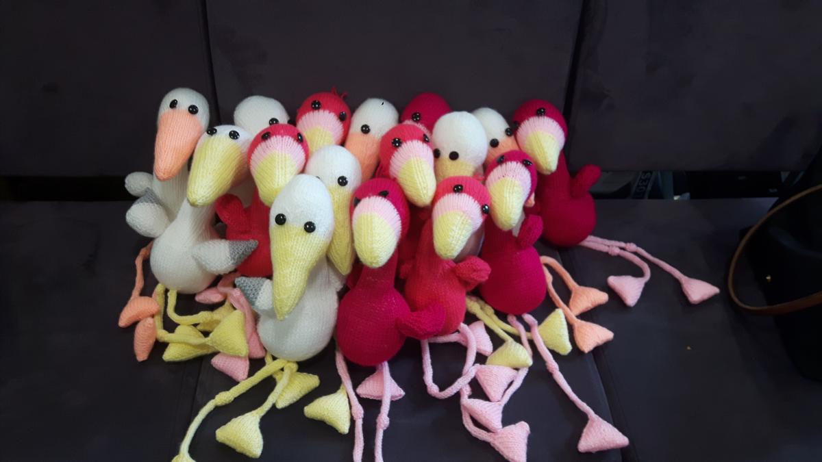Collection of hand-knitted storks