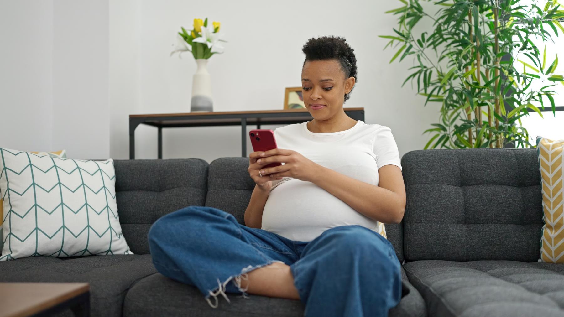 pregnant lady using phone