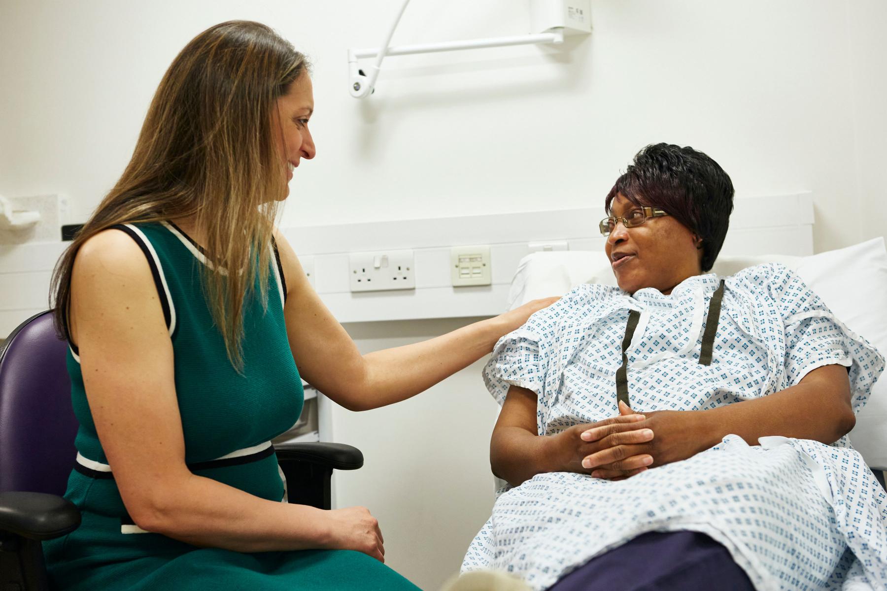 A consultant talks to a cancer patient at St Bartholomew's Hospital