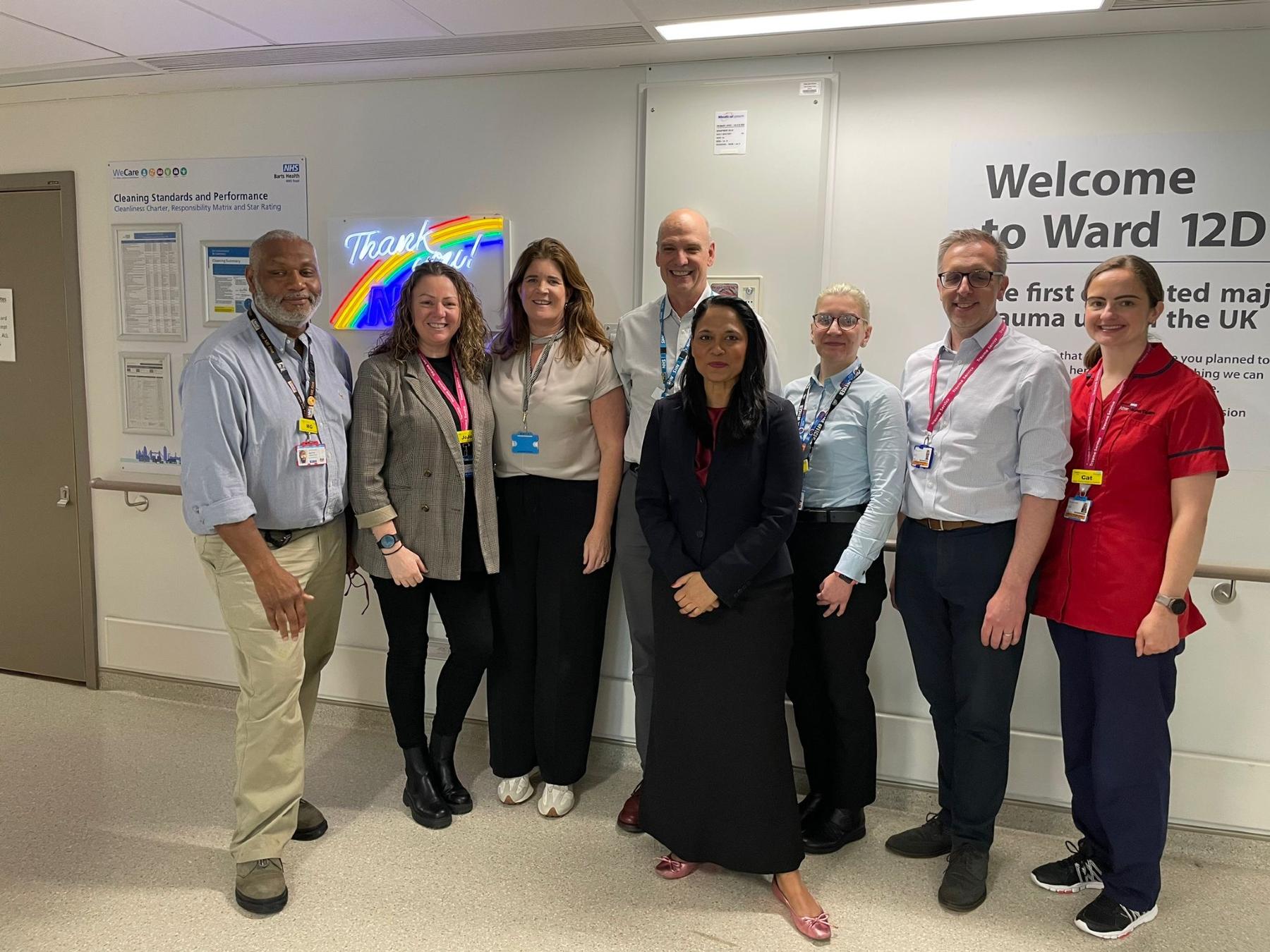 Rushanara Ali with members of the hospital's trauma team