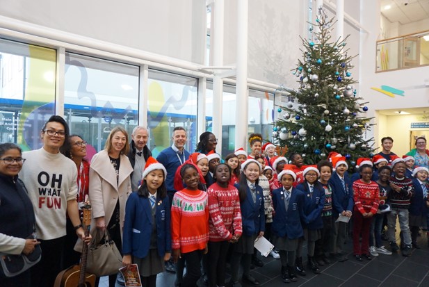 Newham Christmas light switch on, featuring St Edwards and St Antony's Catholic Primary Schools next to the Christmas tree