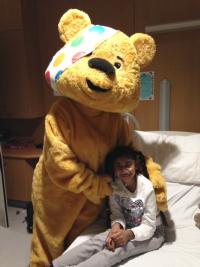 Pudsey the bear with a patient 